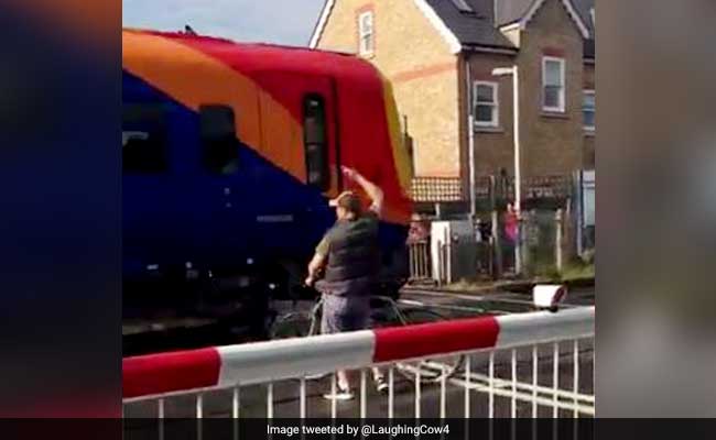 Cyclist Nearly Killed By Train After Squeezing Through Safety Barriers