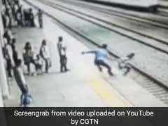 Video: Heroic Man Saves Suicidal Woman From Jumping In Front Of Train