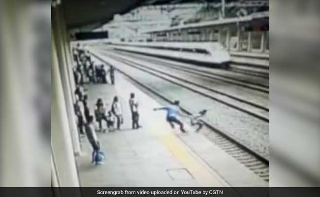 Video: Heroic Man Saves Suicidal Woman From Jumping In Front Of Train