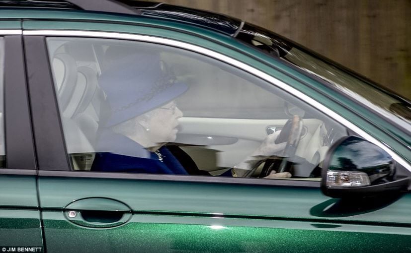 queen elizabeth driving her jaguar