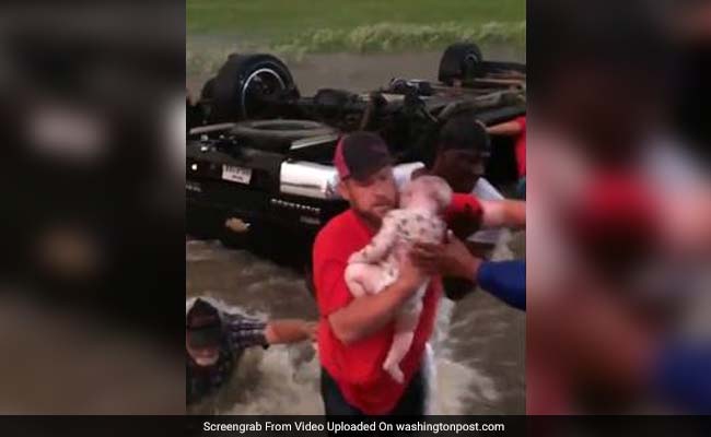 Harrowing Rescue Of Infant, Toddler From Floodwaters Caught On Video
