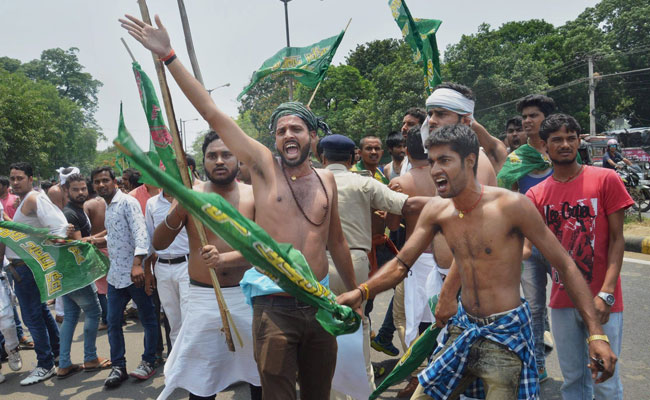 Shirtless Protest By Lalu Yadav's Partymen At BJP Office Day After Raids