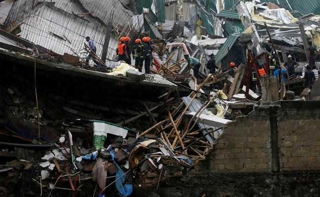 Rescuers Scramble To Save Woman Trapped In Sri Lanka Building Collapse