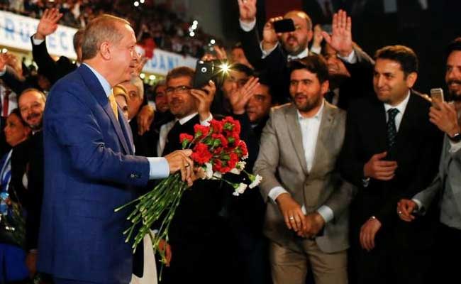 Turkey's Tayyip Erdogan Vows Fight Against Enemies As He Returns To Lead Party