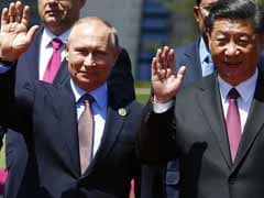 At China's Biggest Diplomatic Event Of Year, Putin Treated Special
