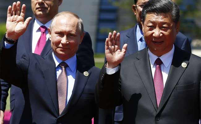 Xi Jinping, Putin Hail 'New Era' Of Ties In United Front Against West 1