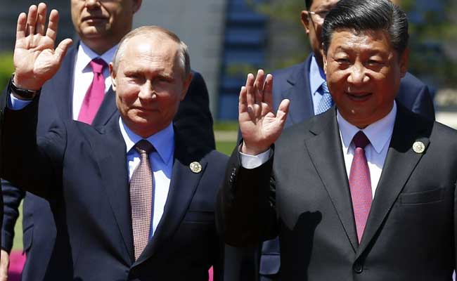At China's Biggest Diplomatic Event Of Year, Putin Treated Special