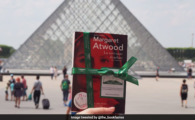 Actor Emma Watson Plays Book Fairy, Hides 100 Books Around Paris