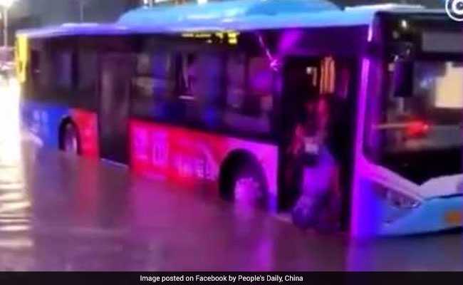 Watch: Bus Driver Carries Passengers On His Back During Flood