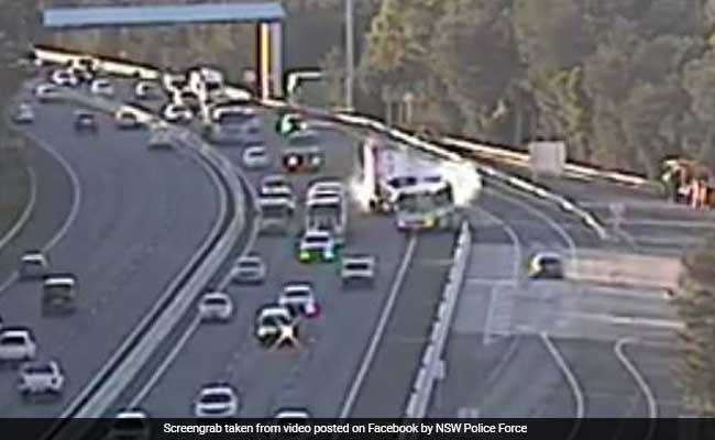Video: School Bus Carrying 20 Children Nearly Collides With Truck