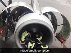 Chinese Passenger Throws Coins Into Plane Engine For Good Luck