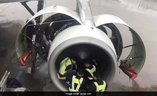 Chinese Passenger Throws Coins Into Plane Engine For Good Luck