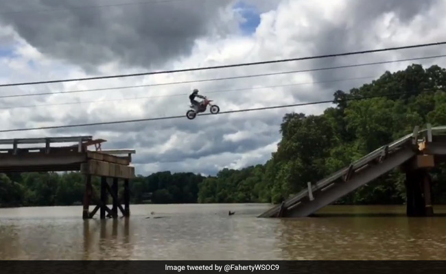 Watch: Daredevil Bikers Recklessly Jump Across Partially Collapsed Bridge