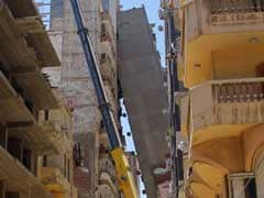 A 13-Storey-Apartment Block In Egypt Tilts Across Street
