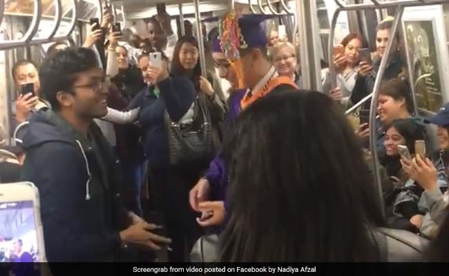 Commuters Throw Impromptu Graduation Party For Student Stuck On Train