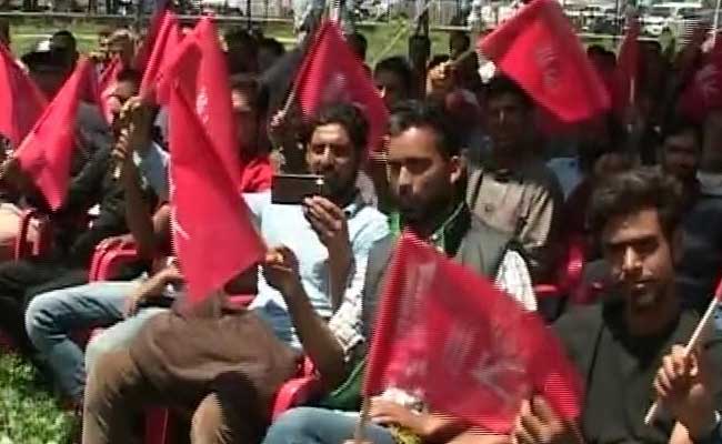 Hundreds Wave Flags In Srinagar To Mark Jammu And Kashmir State Flag Day