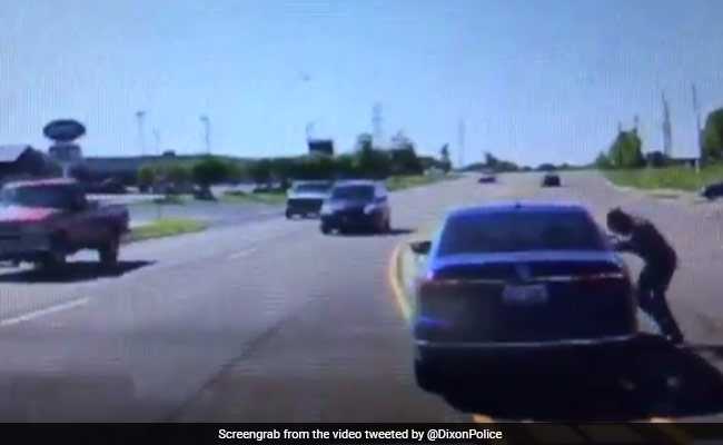 Watch: Man Heroically Dives Into Moving Car To Help Driver Having Seizure
