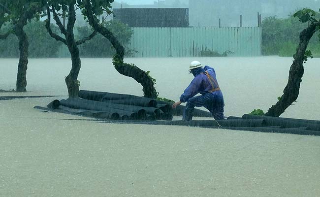 One Dead, Two Missing As Taiwan Battles Floods