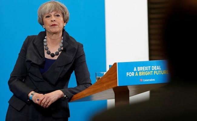 British Prime Minister Theresa May Seen 13 Seats Short Of Majority: Report