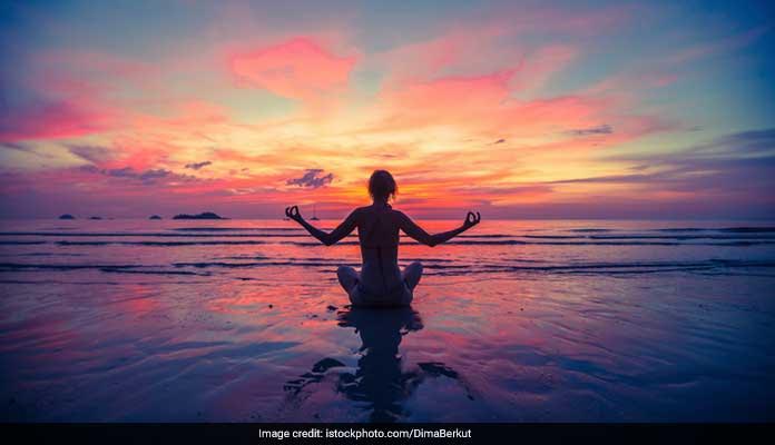 6 Best Beach Yoga Asanas to Start Your Day on a Positive Note