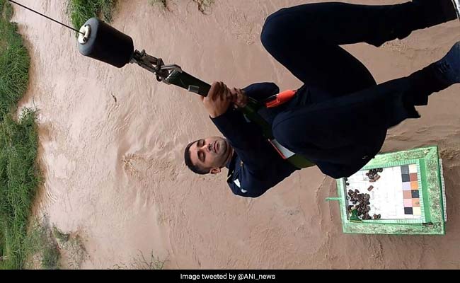 Rescue Teams Airlift, Piggyback, Row People Down In Rain-Ravaged States