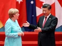 Panda Diplomacy: Angela Merkel, Xi Jinping Pushed Into Awkward Embrace Before G20 Summit