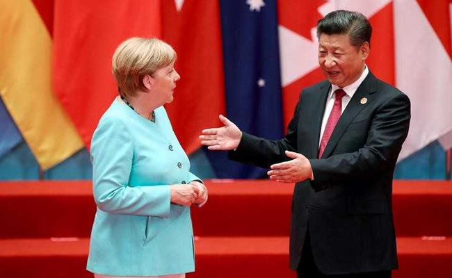 Panda Diplomacy: Angela Merkel, Xi Jinping Pushed Into Awkward Embrace Before G20 Summit