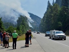 Canada Wildfires Disrupt Industry, Force 14,000 From Homes