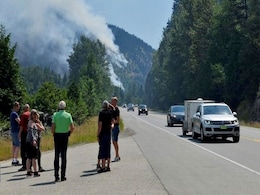 Canada Wildfires Disrupt Industry, Force 14,000 From Homes Canada Wildfires Disrupt Industry, Force 14,000 From Homes