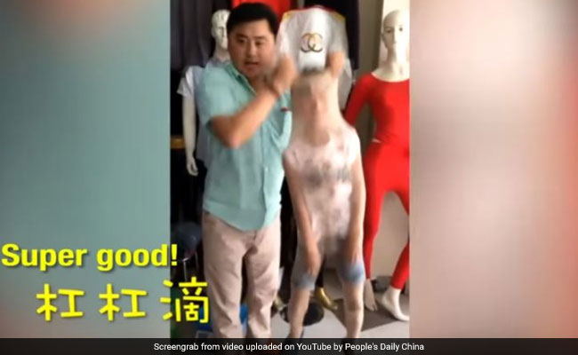 Man Squeezes 8-Year-Old Son Into Pair Of Stockings To Promote Business