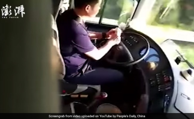 Caught On Camera: Driver Peels Apple While Driving Bus, Fired