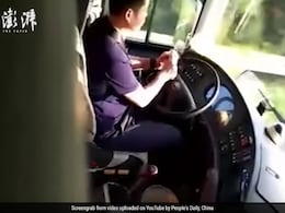 Caught On Camera: Driver Peels Apple While Driving Bus, Fired Caught On Camera: Driver Peels Apple While Driving Bus, Fired