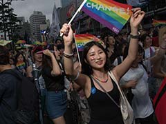 Gay Rights Supporters Parade Amid Rain, Protests In Seoul