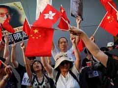 China's President Xi Jinping Talks Tough On Hong Kong As Thousands Protest For Democracy