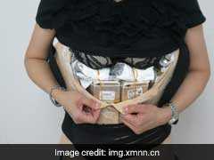 Woman Tries To Smuggle 102 iPhones Under Her Clothes, Gets Busted