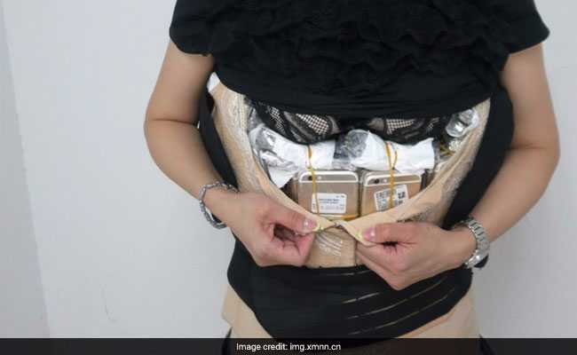 Woman Tries To Smuggle 102 iPhones Under Her Clothes, Gets Busted