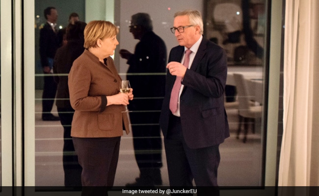 Call Interrupts Press Meet. On The Phone, German Chancellor Angela Merkel