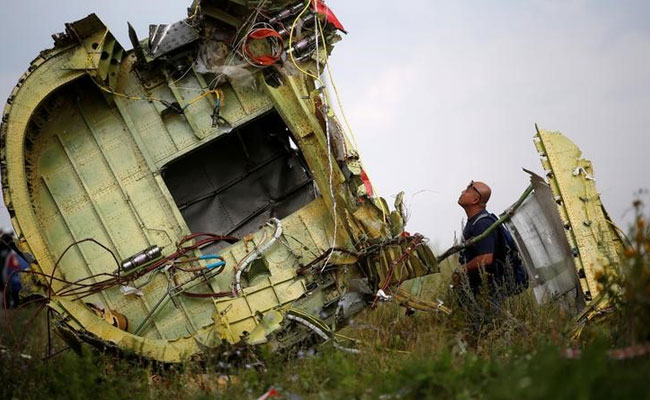 3 Russians, 1 Ukrainian Charged With Murder In MH17 Plane Crash Case