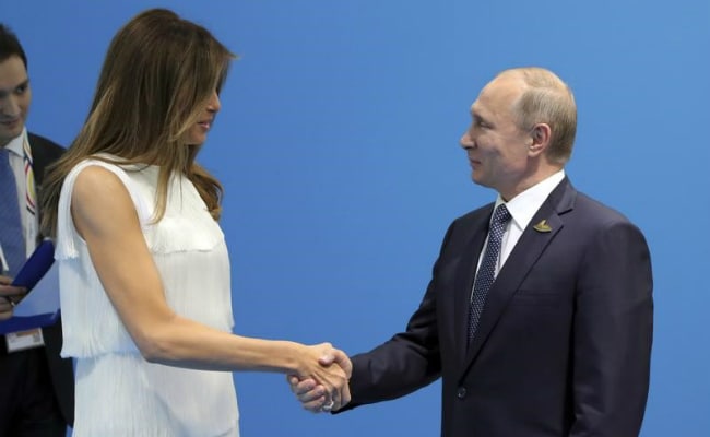 melania trump putin reuters