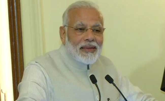 पीएम मोदी ने किया 'प्रेसिडेंट प्रणब मुखर्जी-अ स्टेट्समैन' किताब का अनावरण