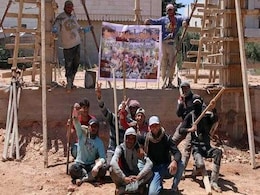 'You Destroy, We Rebuild': A Builder's Life In War-Hit Syria 'You Destroy, We Rebuild': A Builder's Life In War-Hit Syria