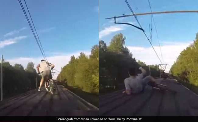 Watch: Cyclists Attempt Riding On Roof Of Moving Train