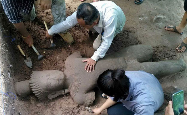 Ancient Statue Unearthed At Cambodia's Angkor Complex