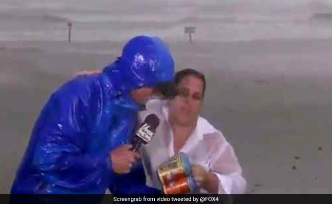 Hurricane Harvey: Woman Interrupts Reporter On Live TV To Hand Him Beers