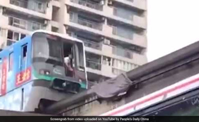 Train That Passes Through High-Rise Comes To Halt For The Weirdest Reason