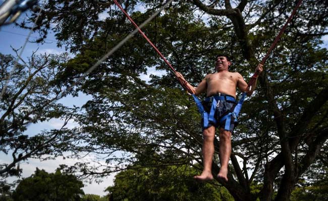 Blind Visitors In Colombia Try Salsa, Paragliding