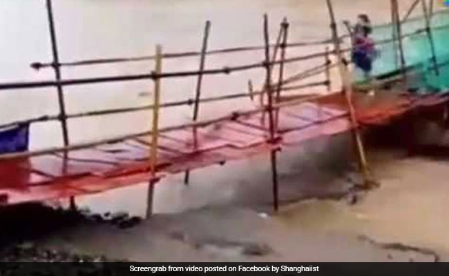 Watch: Woman Runs Across Wobbly Bridge. Seconds Later, It Is Swept Away