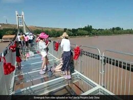 Walking On Water? Glass Bridge Hangs Above River In China. Watch Video Walking On Water? Glass Bridge Hangs Above River In China. Watch Video