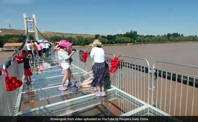 Walking On Water? Glass Bridge Hangs Above River In China. Watch Video