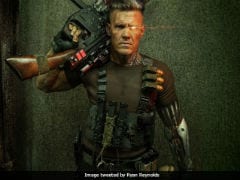 <i>Deadpool 2</i>: Ryan Reynolds Posts First Look Of Josh Brolin As Cable. With Guns And, Umm, Teddy Bear